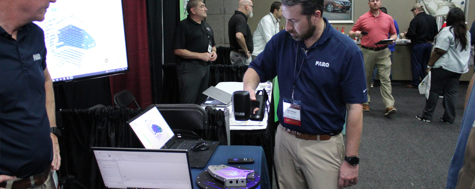 FARO booth demonstrating 3D scanning capabilities
