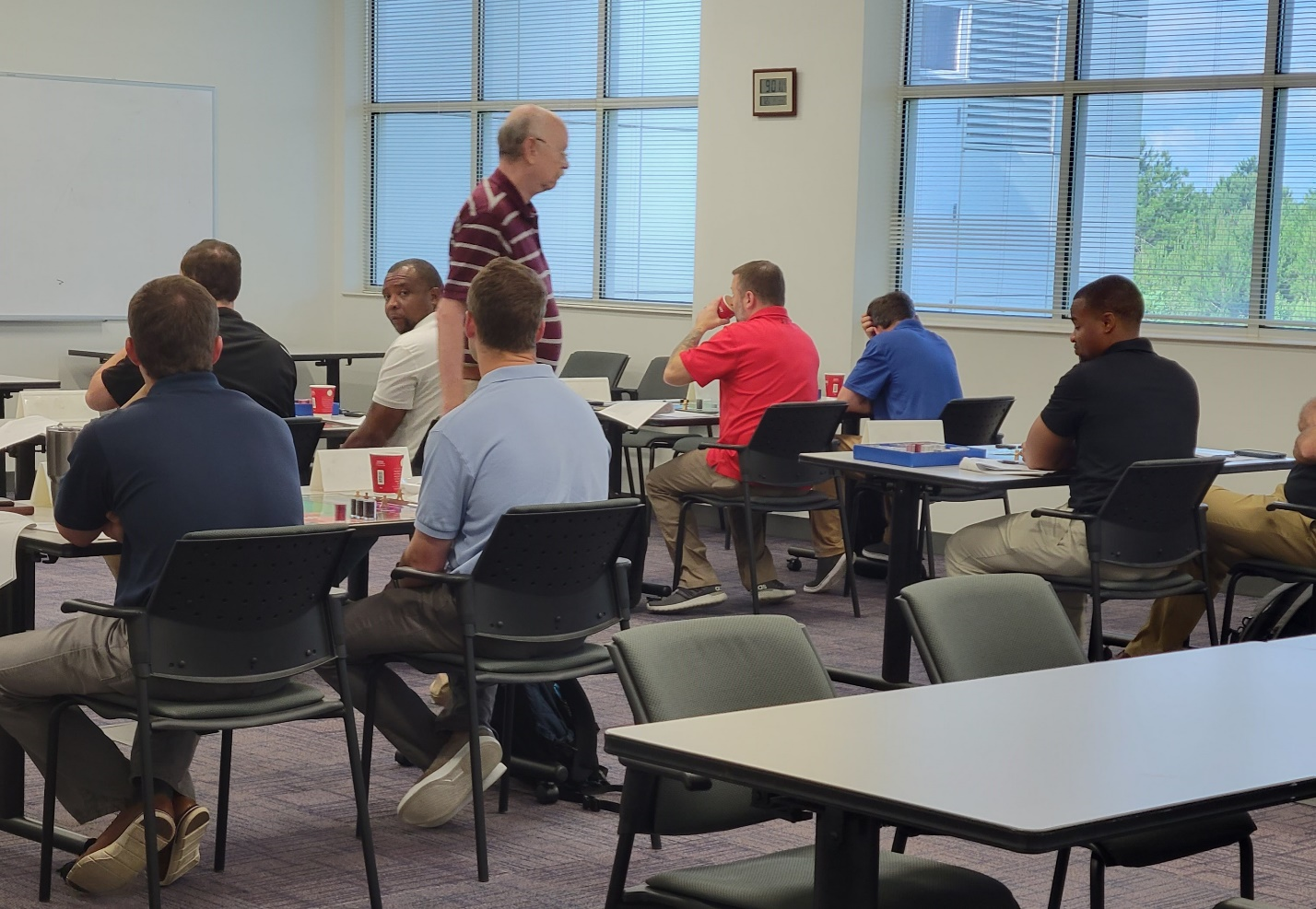 Pictured: Steve Puryear, CAVS-E Instructor, and students participating in the Financial Fundamentals course